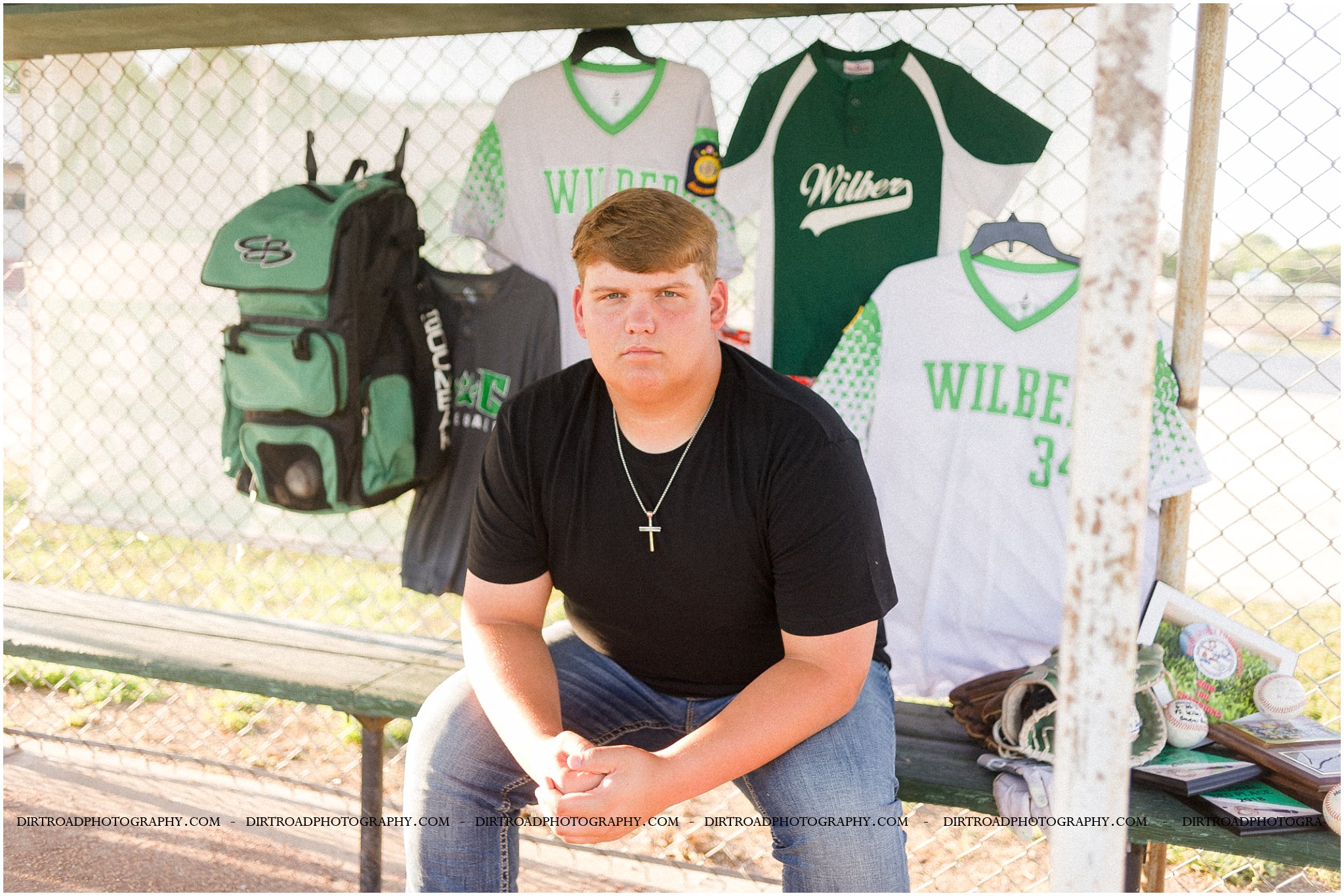 Take a look at Owen's baseball senior pictures. He's a local Nebraska senior who took his senior portraits on the ball field. Baseball senior pictures on a ball field at sunset.