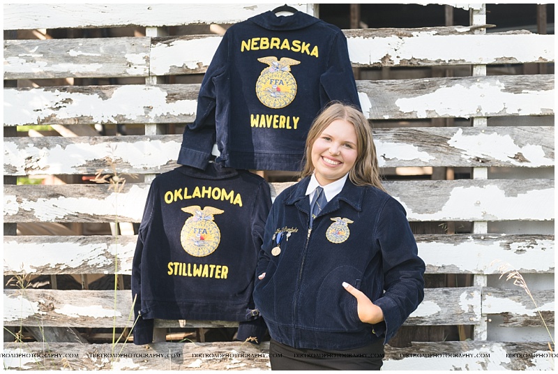 Nebraska senior photographer capturing Waverly High School senior Esther VanOverbeke in her FFA jacket on a farm.